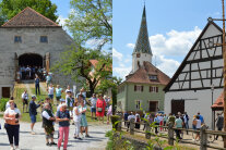 Blick auf die zwei Golddörfer mit vielen Menschen und Gebäuden.